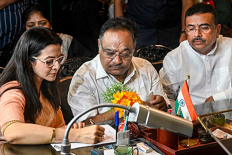 West Bengal Chief Minister Suvendu Adhikari, right, with Bengali film actor Koel Mallick, as she files her nomination for the Rajya Sabha election, at the West Bengal Legislative Assembly, in Kolkata, West Bengal.