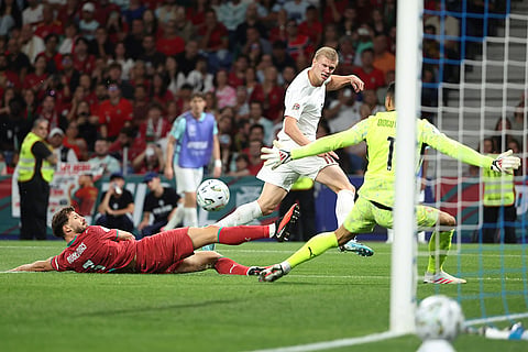 Norway's Erling Haaland, center, attempts a shot at goal during the Nations League soccer match between Portugal and Norway in Porto, Portugal, Sunday, Oct. 4, 2026.