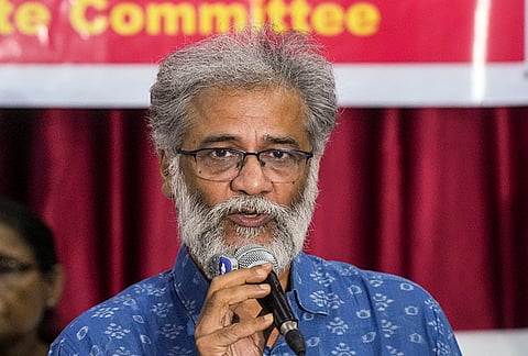 CPI(ML) Liberation General Secretary Dipankar Bhattacharya addresses a press conference at the AIKS office in Kolkata, West Bengal.
