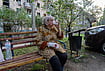 In Photos: Russian Bombardment Hits Kharkiv | Photo: AP/Andrii Marienko : An injured woman drinks water in front of a residential house damaged by a Russian strike in Kharkiv, Ukraine, Monday, Oct. 5, 2026.