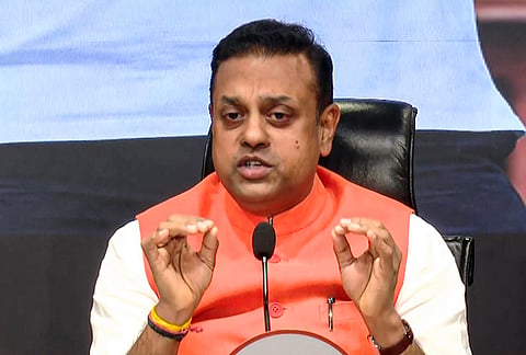 BJP MP and national spokesperson Sambit Patra addresses a press conference, in New Delhi.