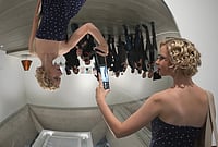 Art, Fashion And Nostalgia In Photos: Inside Tate Britain’s 90s Exhibition | Photo: AP/Kin Cheung : Inverse Reverse Perverse by Cerith Wyn Evans is on display during a media preview of "The 90s: Art and Fashion exhibition" at Tate Britain in London, Tuesday, Oct. 6, 2026.