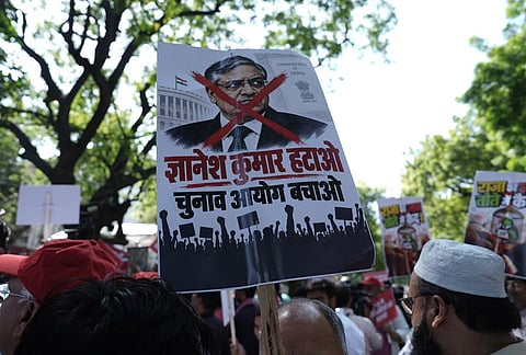 INDIA bloc Supporters during a protest march from Parliament toward the Election Commission of India (ECI) office, demanding the resignation of Chief Election Commissioner Gyanesh Kumar, near Reserve Bank of India (RBI) office, in New Delhi, Tuesday, Oct. 6, 2026. 
