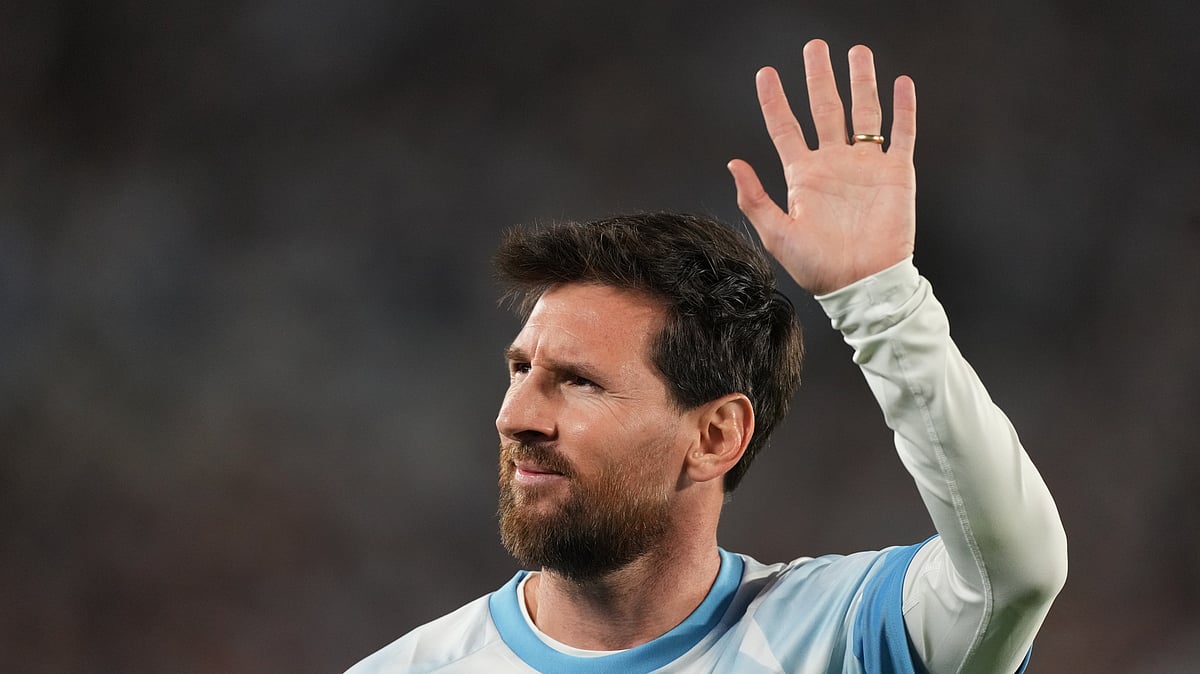 Argentina's Lionel Messi waves to fans before an international friendly soccer match against Benin, marking his farewell appearance for the national team, in Buenos Aires, Argentina, Tuesday, Oct.6, 2026. - (AP Photo/Gustavo Garello)