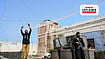 Pakistan’s Unlikely Anti-Drone Defence: How Fishing Nets Are Being Used At Police Posts | Abdul Majeed / AFP : A security official stands beneath a reinforced mesh canopy installed over a police post in Bara, Khyber Pakhtunkhwa, as authorities adopt physical barriers against militant drone attacks