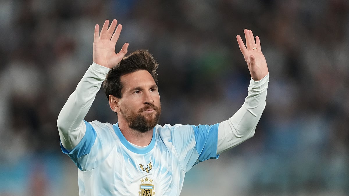 Argentina's Lionel Messi waves to fans before an international friendly soccer match against Benin, marking his farewell appearance for the national team, in Buenos Aires, Argentina, Tuesday, Oct.6, 2026. - (AP Photo/Gustavo Garello)