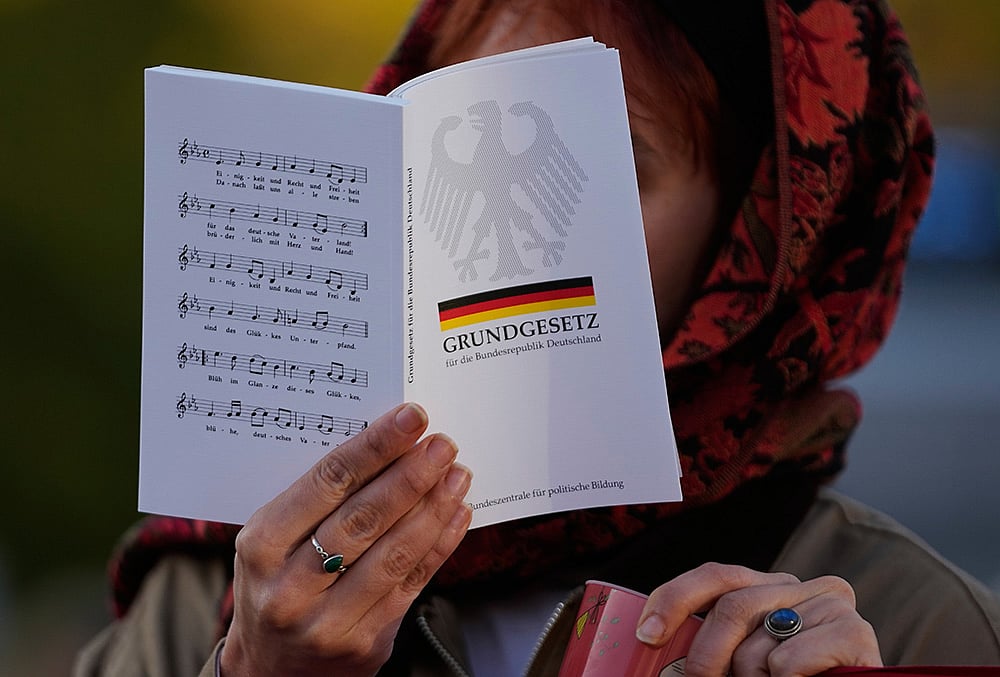 Remigration protest slogans Germany

