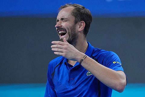 Daniil Medvedev, of Russia, reacts during the men's single semi-final match against Novak Djokovic, of Serbia, at the China Open tennis tournament in Beijing, Monday, Oct. 5, 2026.
