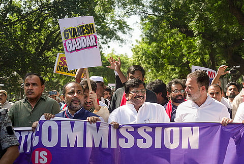 Leader of Opposition in the Lok Sabha Rahul Gandhi, Shiv Sena (UBT) MP Sanjay Raut and others during a protest march from Parliament to the Election Commission of India (ECI) office, demanding the resignation of Chief Election Commissioner Gyanesh Kumar, in New Delhi, Tuesday, Oct. 6, 2026. 
