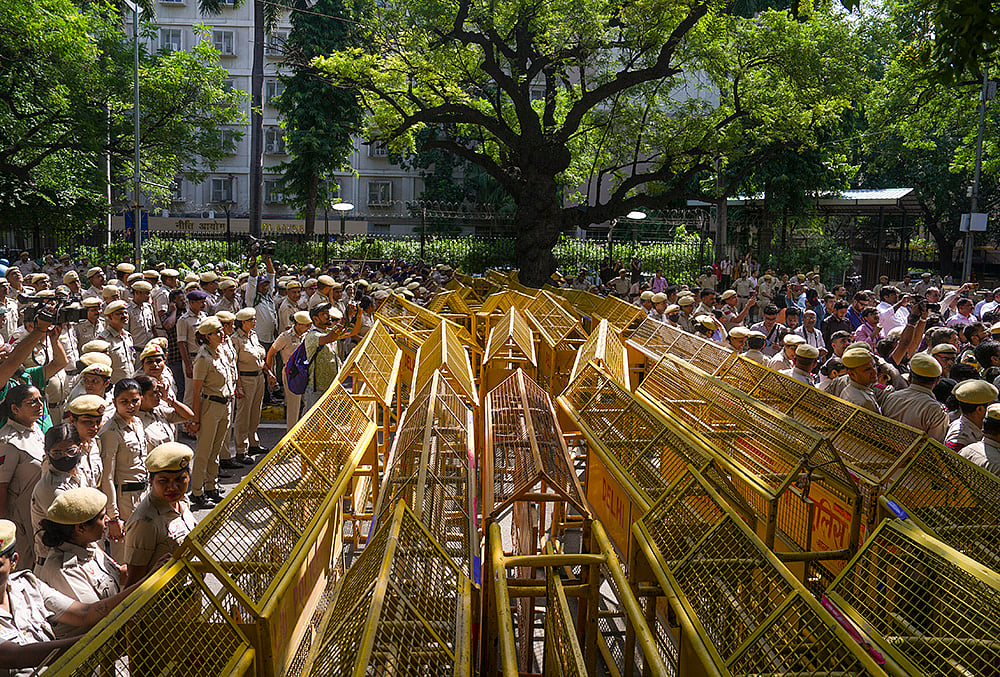 Heavy security deployment and multi-layered police barricades placed to block INDIA bloc MPs and leaders from marching towards the Election Commission of India (ECI) office, near NITI Aayog, in New Delhi. - | Photo: PTI/Karma Bhutia
