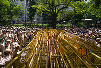 Day In Pics: October 06, 2026 | Photo: PTI/Karma Bhutia : Heavy security deployment and multi-layered police barricades placed to block INDIA bloc MPs and leaders from marching towards the Election Commission of India (ECI) office, near NITI Aayog, in New Delhi.