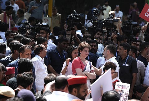 Congress MP Priyanka Gandhi Vadra and LoP Lok Sabha Rahul Gandhi during a protest march from Parliament toward the Election Commission of India (ECI) office, demanding the resignation of Chief Election Commissioner Gyanesh Kumar, near Reserve Bank of India (RBI) office, in New Delhi, Tuesday, Oct. 6, 2026. 
