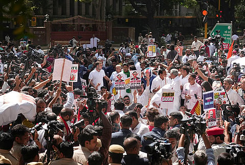 Leader of Opposition in the Lok Sabha Rahul Gandhi along with senior opposition leaders and MPs from the INDIA bloc during a protest march from Parliament toward the Election Commission of India (ECI) office, demanding the resignation of Chief Election Commissioner Gyanesh Kumar, near Reserve Bank of India (RBI) office, in New Delhi, Tuesday, Oct. 6, 2026. 
