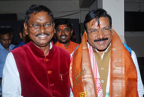 Newly-appointed Jharkhand BJP in-charge Gajendra Singh Patel, right, with former Jharkhand chief minister Arjun Munda arrive to attend the Jharkhand BJP Core Committee meeting, in Ranchi.