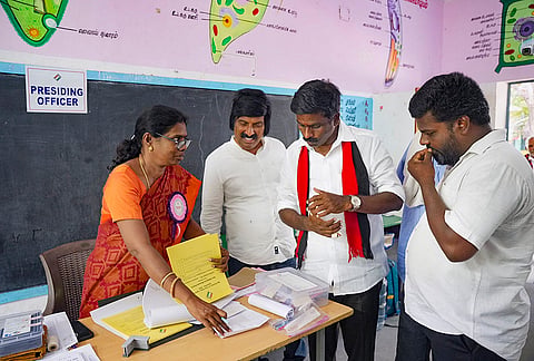 DMK candidate for the Madurantakam constituency, I. Paranthamen, during a visit to a polling station on the day of voting in the Assembly bypolls, at Madurantakam in Chengalpattu district, Tamil Nadu.