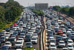 | Photo: PTI  : Heavy traffic movement and slow-moving vehicles seen on National Highway-24 near Akshardham following traffic diversions, in New Delhi.