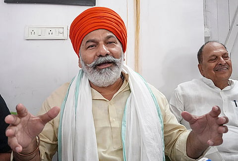 Bharatiya Kisan Union (BKU) national spokesperson Rakesh Tikait addresses a press conference regarding concerns over land acquisition and circle rates for the proposed satellite township project, in Bihar, in Patna. Tikait demanded fair compensation and an update to current market land rates for farmers whose lands are being acquired. 

