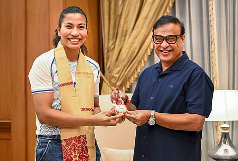 Assam Chief Minister Himanta Biswa Sarma felicitates boxer Lovlina Borgohain during a meeting, in Guwahati. Sarma presented a cheque of ₹50 lakh to Borgohain in recognition of her gold medal win in the women's 75kg boxing event at the 20th Asian Games. 