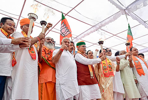 Union Minister of State (I/C) for Law and Justice Arjun Ram Meghwal and BJP workers during the 'Viksit Bharat Sankalp Sabha', marking PM Narendra Modi's 25 years in public office, in Bikaner, Wednesday, Oct. 7, 2026. 
