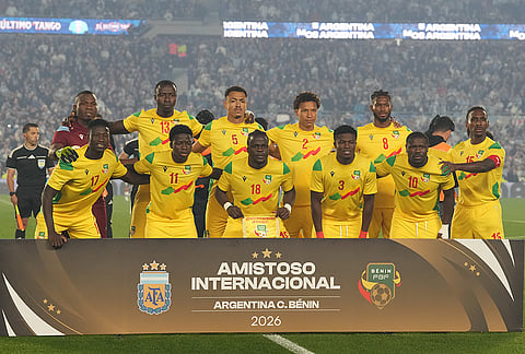 Benin's line up for a team photo before an international friendly soccer match against Argentina, in Buenos Aires, Argentina, Tuesday, Oct.6, 2026. 