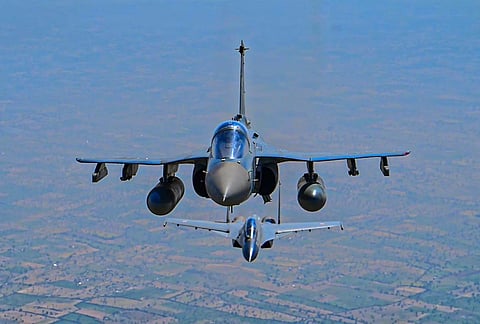 Indian Air Force (IAF) fighter jets soar in formation during the ongoing multinational air exercise 'Tarang Shakti 2026' at Air Force Station Jodhpur, in Rajasthan. 
