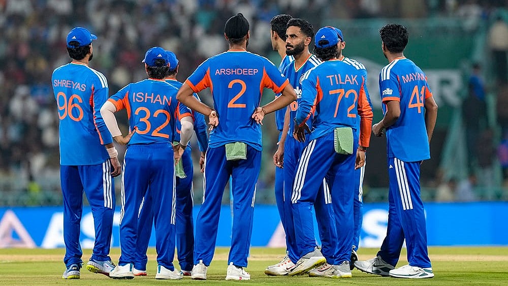 | Photo: PTI/Shahbaz Khan : India's players wait for the decision of the third umpire for the wicket of the West Indies' Matthew Forde during the first T20I cricket match of a series between India and West Indies, in Lucknow, Uttar Pradesh, Tuesday, Oct. 6, 2026. 