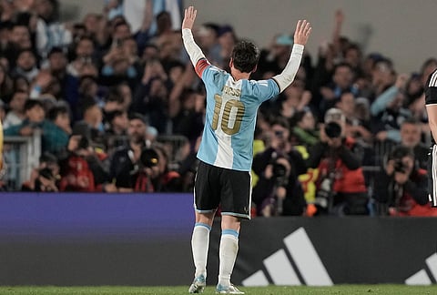 Argentina's Lionel Messi celebrates after scoring his goal from the penalty spot during his final match for the national team, a soccer friendly against Benin, in Buenos Aires, Argentina, Tuesday, Oct.6, 2026. 