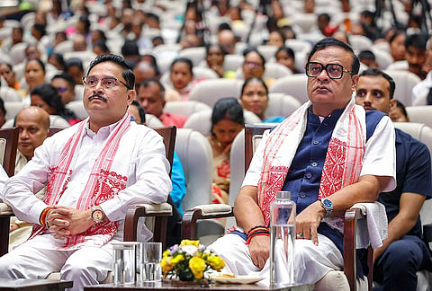 Assam CM Himanta Biswa Sarma and state BJP President Dilip Saikia during the   'Viksit Bharat Sankalp Sabha', marking PM Narendra Modi's 25 years in public office, in Sivasagar. 
