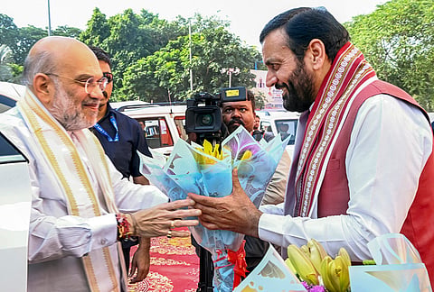 Union Home Minister Amit Shah being welcomed by Haryana CM Nayab Saini on his arrival, in Gurugram. 
