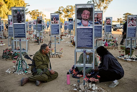 People mark the third anniversary of the Oct. 7, 2023, Hamas attack on Israel at the site of the Nova music festival, where hundreds of revelers were killed and abducted, near Kibbutz Reim, southern Israel, Wednesday, Oct. 7, 2026. 
