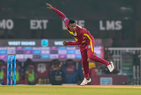 West Indies' Akeal Hosien bowls during the first T20I cricket match of a series between India and West Indies, in Lucknow, Uttar Pradesh, Tuesday, Oct. 6, 2026. 