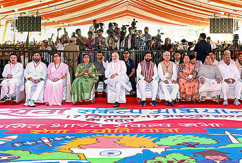 Union Home Minister Amit Shah with Haryana CM Nayab Saini during the 'Viksit Bharat Sankalp Sabha - Seva Jyoti Yatra', marking PM Narendra Modi's 25 years in public office, in Gurugram.