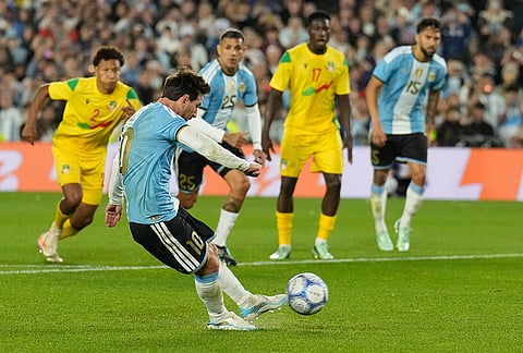 Argentina's Lionel Messi scores from the penalty spot his side's third goal during an international friendly soccer match against Benin, marking his farewell appearance for the national team, in Buenos Aires, Argentina, Tuesday, Oct.6, 2026. 