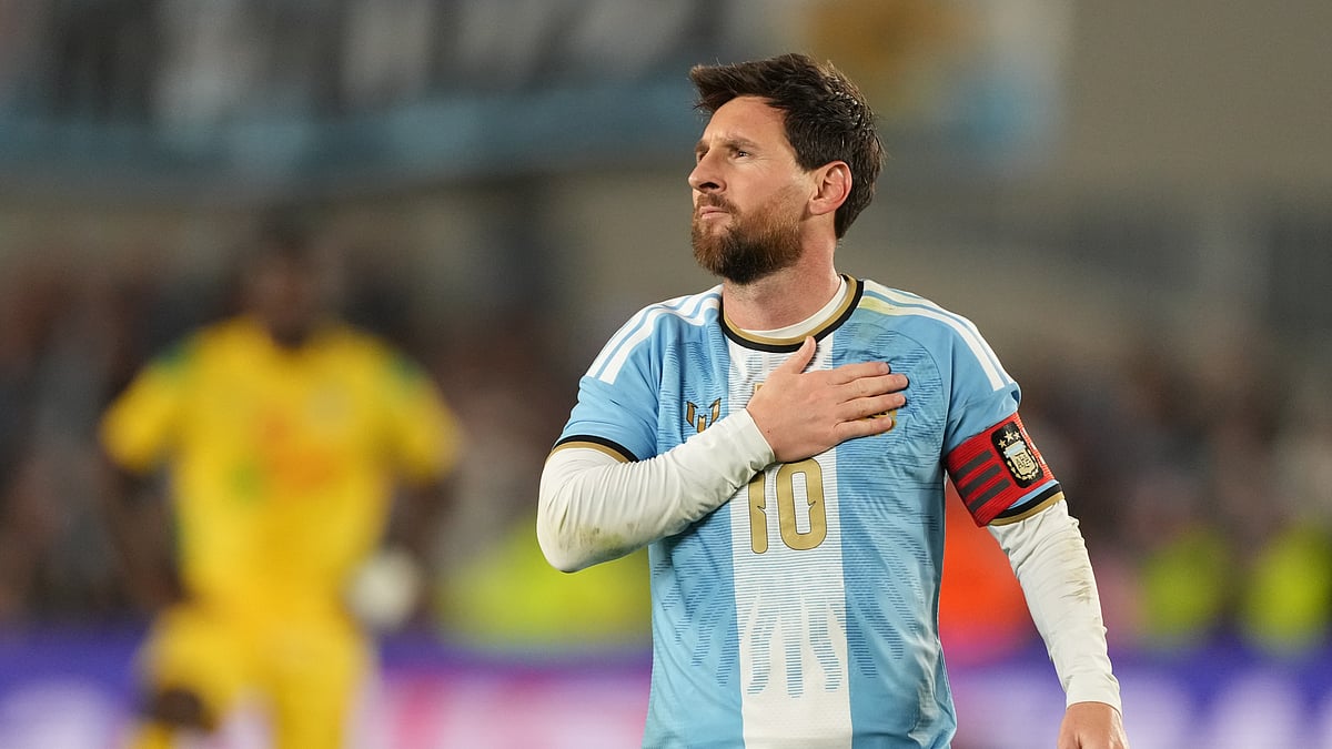 Argentina's Lionel Messi celebrates after scoring his third goal from the penalty spot during his final match for the national team, a soccer friendly against Benin, in Buenos Aires, Argentina, Tuesday, Oct.6, 2026. - (AP/Photo/Gustavo Garello)
