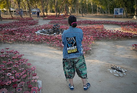 People mark the third anniversary of the Oct. 7, 2023, Hamas attack on Israel at the site of the Nova music festival, where hundreds of revelers were killed and abducted, near Kibbutz Reim, southern Israel, Wednesday, Oct. 7, 2026. 
