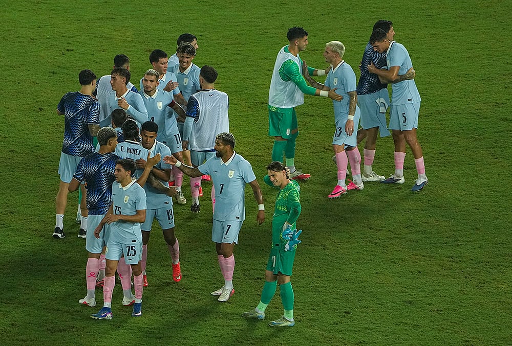 Uruguay's players shakes hands after winning an International friendly Football match between India and Uruguay, in Kolkata, Tuesday, Oct. 6, 2026.  - | Photo: PTI/Manvender Vashist Lav