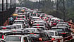 | Photo: PTI : Vehicles stuck in traffic on the Barapullah flyover after monsoon rains, in New Delhi, Tuesday, July 7, 2026. 