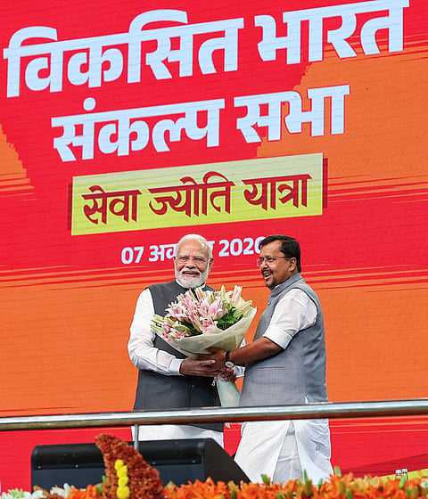 Prime Minister Narendra Modi is felicitated by BJP National President Nitin Nabin during the Viksit Bharat Sankalp Sabha at the Indira Gandhi Indoor Stadium, in New Delhi. The event marks PM Modi completing 25 years as head of government in public office, tracing back to October 7, 2001, when he was sworn in as the Chief Minister of Gujarat. 
