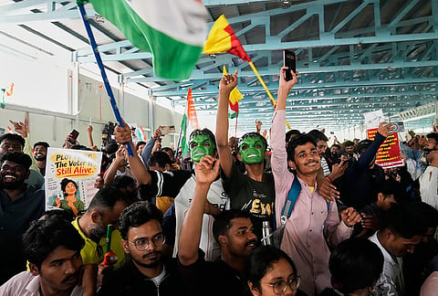 Supporters of India's Cockroach Janta Party display placards during a protest gathering demanding the resignation of the country's election chief Gyanesh Kumar, in Bengaluru, India, Thursday, Oct. 8, 2026. 
