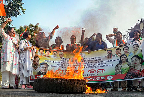 Opposition party workers stage a protest against Chief Election Commissioner (CEC) Gyanesh Kumar, in Bhubaneswar, Thursday, Oct. 8, 2026. 
