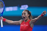 Qinwen Zheng Survives Three-Set Battle Against Alina Charaeva To Reach Quarterfinals | Photo: AP/Achmad Ibrahim : Zheng Qinwen, of China, celebrates after defeating Alina Charaeva, of Armenia in the fourth round of the women's singles match at the China Open tennis tournament in Beijing, Wednesday, Oct. 7, 2026.