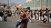Houthi Strikes Kill 3, Injure 36 At Saudi Airports; India Condemns Attacks AP Photo/Osamah Abdulrahman : A Houthi supporter carries a rifle while attending an armed tribal rally in Sanaa, Yemen