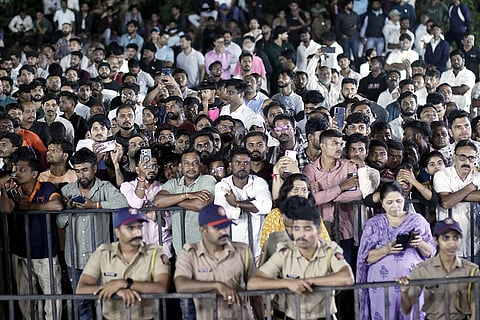 People gather during the cremation of veteran actor Nana Patekar at his farmhouse at Donje village, in Pune district, late Thursday, Oct. 8, 2026. The last rites of the 75-year-old actor, who essayed many memorable roles on the silver screen, were performed with full state honours amid the chants of "Nana Amar Rahe" (Long Live Nana). 