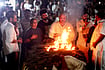 | Photo: PTI : Veteran actor Nana Patekar's son Malhar Patekar lights the pyre with family members during the former's cremation at his farmhouse at Donje village, in Pune district, late Thursday, Oct. 8, 2026. The last rites of the 75-year-old actor, who essayed many memorable roles on the silver screen, were performed with full state honours amid the chants of "Nana Amar Rahe" (Long Live Nana). 