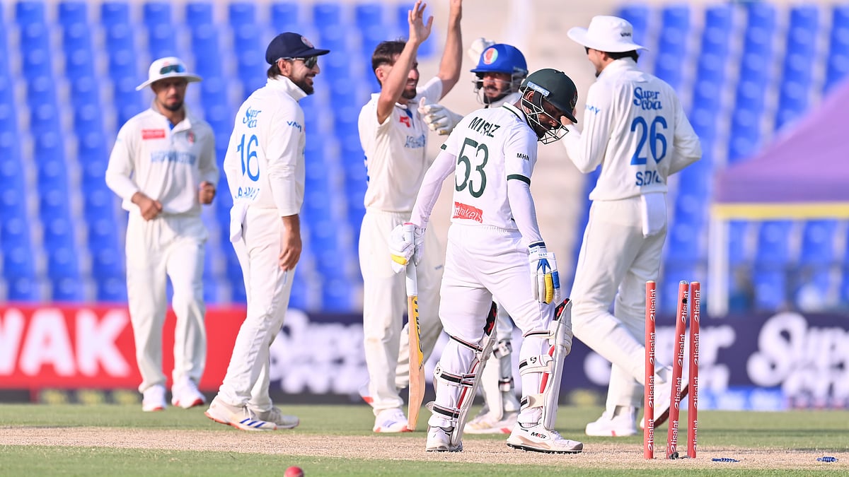 Afghanistan and Bangladesh players in action in the first Test.  - | Photo: X/ACBMedia