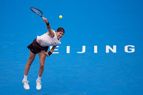 Nikola Bartunkova, of the Czech Republic, serves to Karolina Muchova, of the Czech Republic, during the quarterfinals of the women's singles match at the China Open tennis tournament in Beijing, Thursday, Oct. 8, 2026.