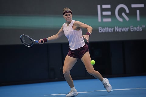 Karolina Muchova of the Czech Republic eyes an incoming ball from Nikola Bartunkova of the Czech Republic during the quarterfinals of the women's singles match at the China Open tennis tournament in Beijing, Thursday, Oct. 8, 2026.