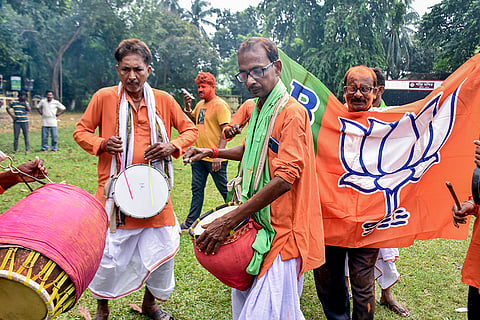 BJP supporters celebrate amid the counting of votes for the Rejinagar Assembly by-election, in Murshidabad district, West Bengal. BJP candidates on Friday widened their leads in Nandigram and Rejinagar seats of West Bengal, where counting of votes was underway for the assembly by-elections, according to EC trends.