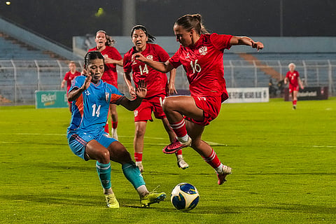 Players of India and Russia vie for the ball during a FIFA international friendly women's football match between India and Russia, at the Kishore Bharati Krirangan, in Kolkata, West Bengal, Thursday, Oct. 8, 2026.