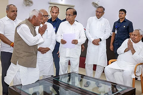 In this image posted on Oct. 9, 2026, Janata Dal (United) National President Nitish Kumar greets party workers and members of the public during an interaction at his official residence, in Patna, Bihar. Bihar JD(U) State President Umesh Singh Kushwaha and state minister Shravan Kumar were among key leaders present as Nitish Kumar addressed public grievances and gave organizational directions.